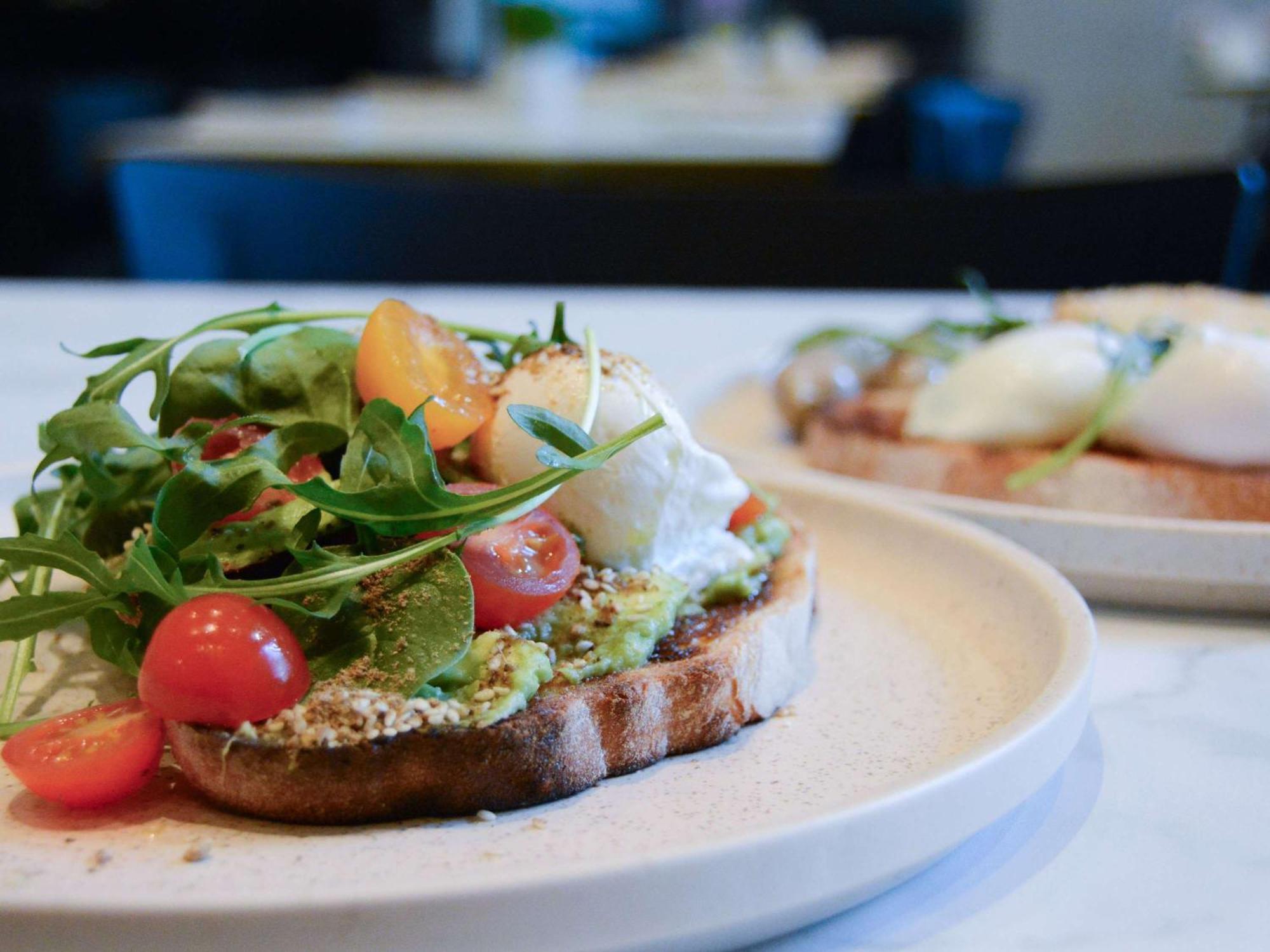 The Como Melbourne Dış mekan fotoğraf Avocado on toast with rocket, cherry tomatoes and goat's cheese